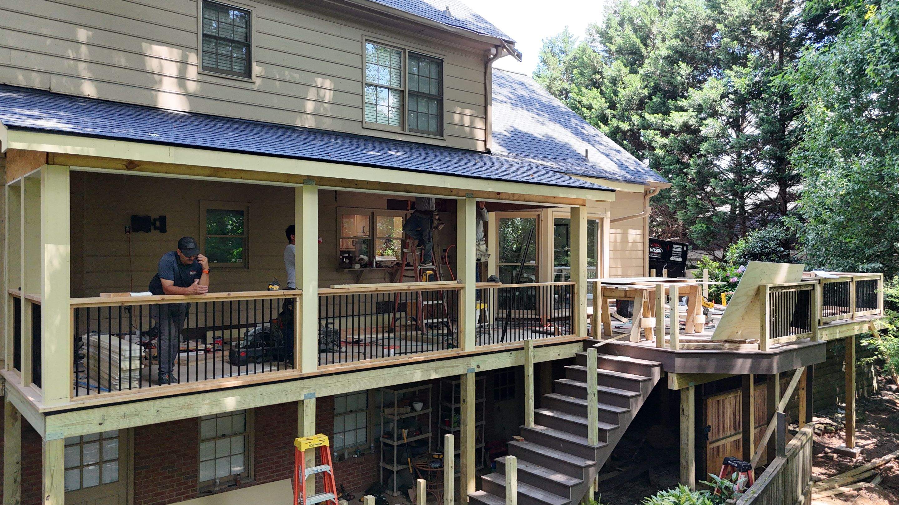 Deckorators Voyage Deck and Shed Style Covered Porch Build with Drink Rail by Nelson Exteriors 