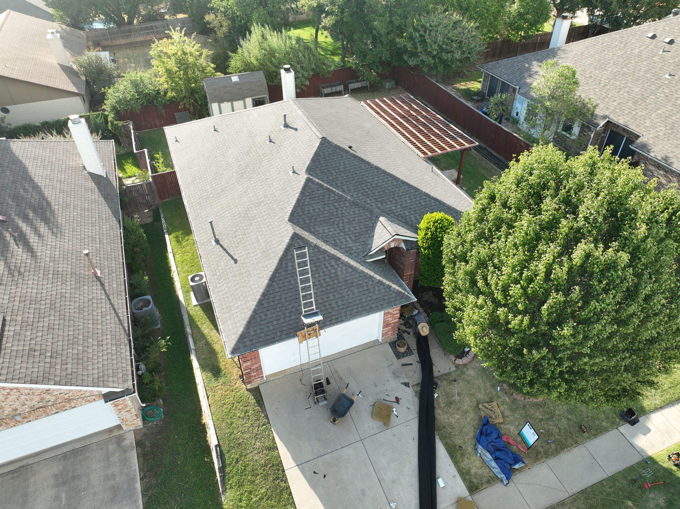 Residential Roofing Installation using TAMKO Titan Weathered Wood by OneSource Roofing and Restoration