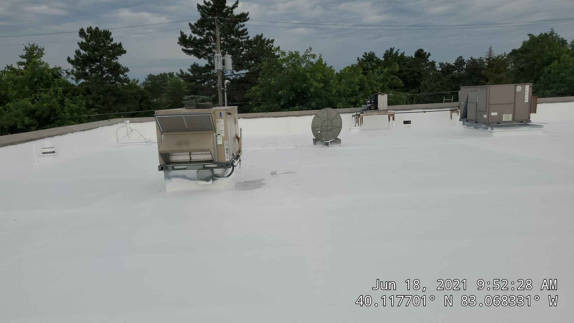 Fabric Reinforced Roof Coating by Gold Star Roofing LLC 
