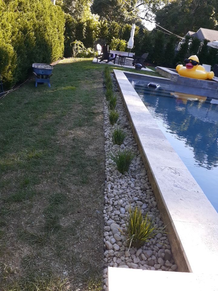 Back Yard Pool Sidewalk and Landscape by LAND ESCAPES LLC