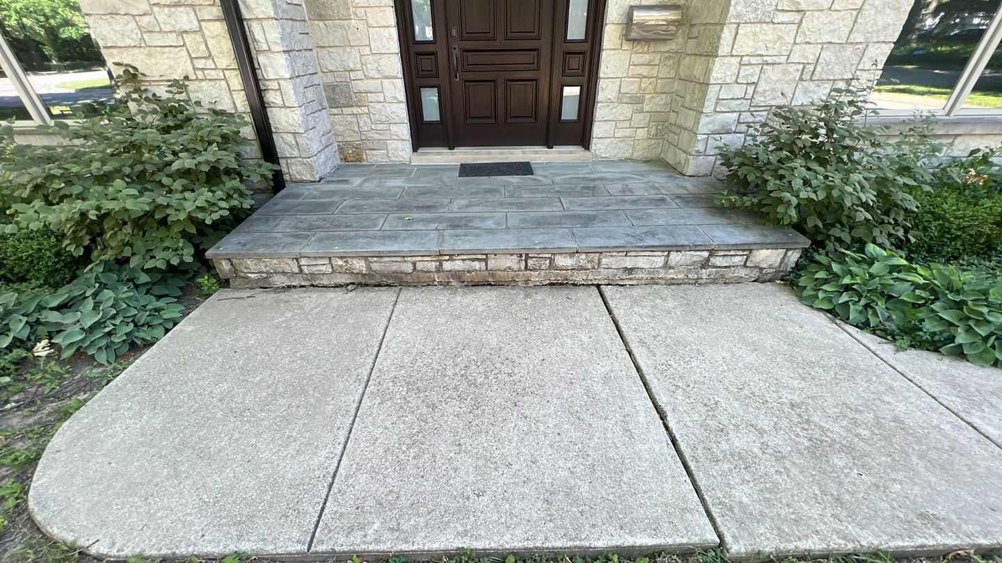 Highland Park, IL Bluestone, concrete,  Trex deck cleaning by Northern Power Washing LLC.