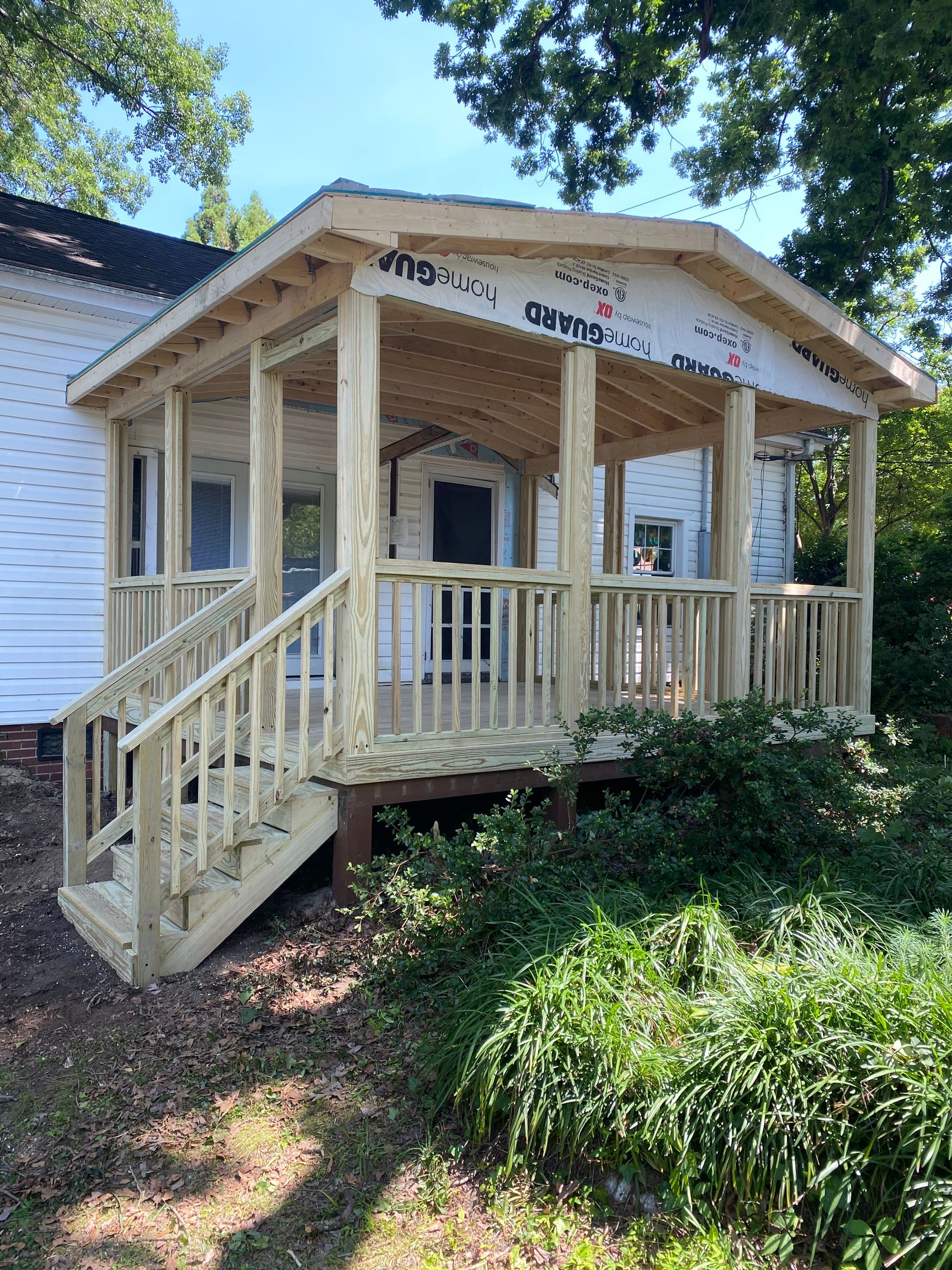 Custom Screened Porch Construction with Gable Roof in Apex by The Remodeling Company