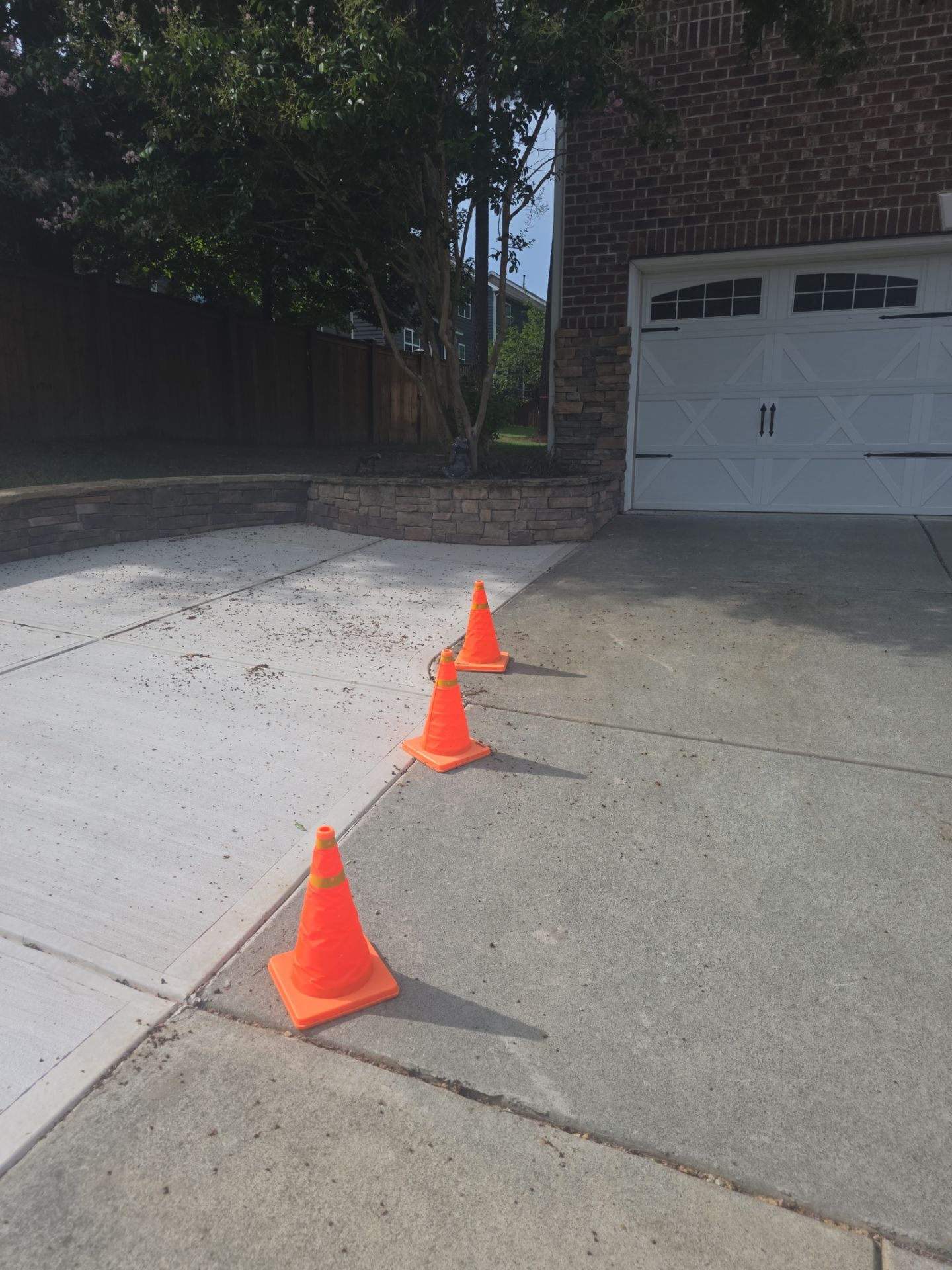 Concrete Driveway Expansion & Retaining Wall | Apex, NC by Elite Remodeling and Design LLC