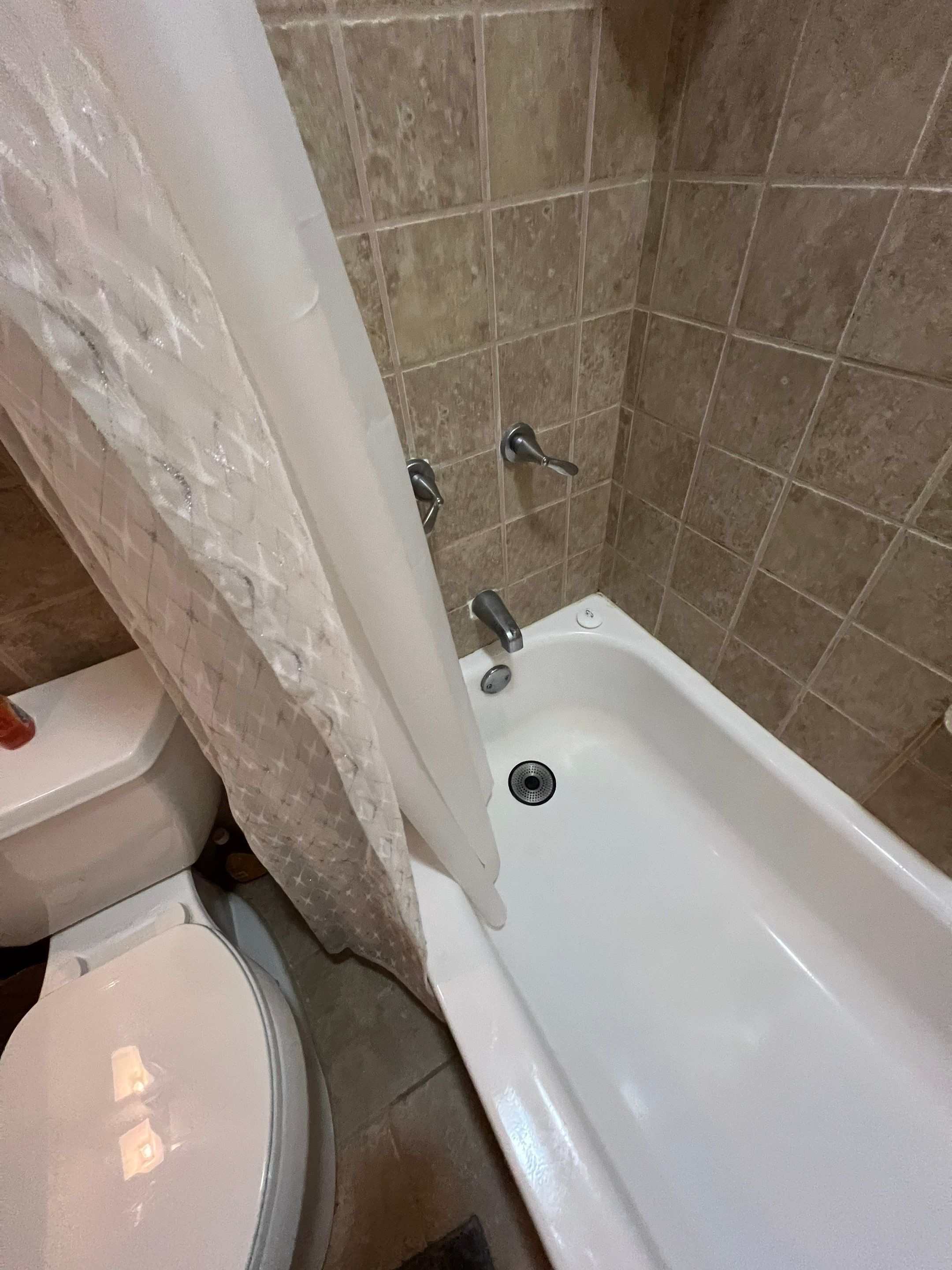 Tub to Shower Conversion using BCI Acrylic Shower System by Secure Construction Company Inc