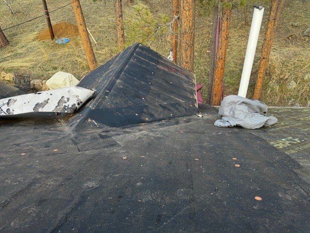 Residential Roofing Installation using Standing Seam Metal by Blue Peaks Roofing LLC 