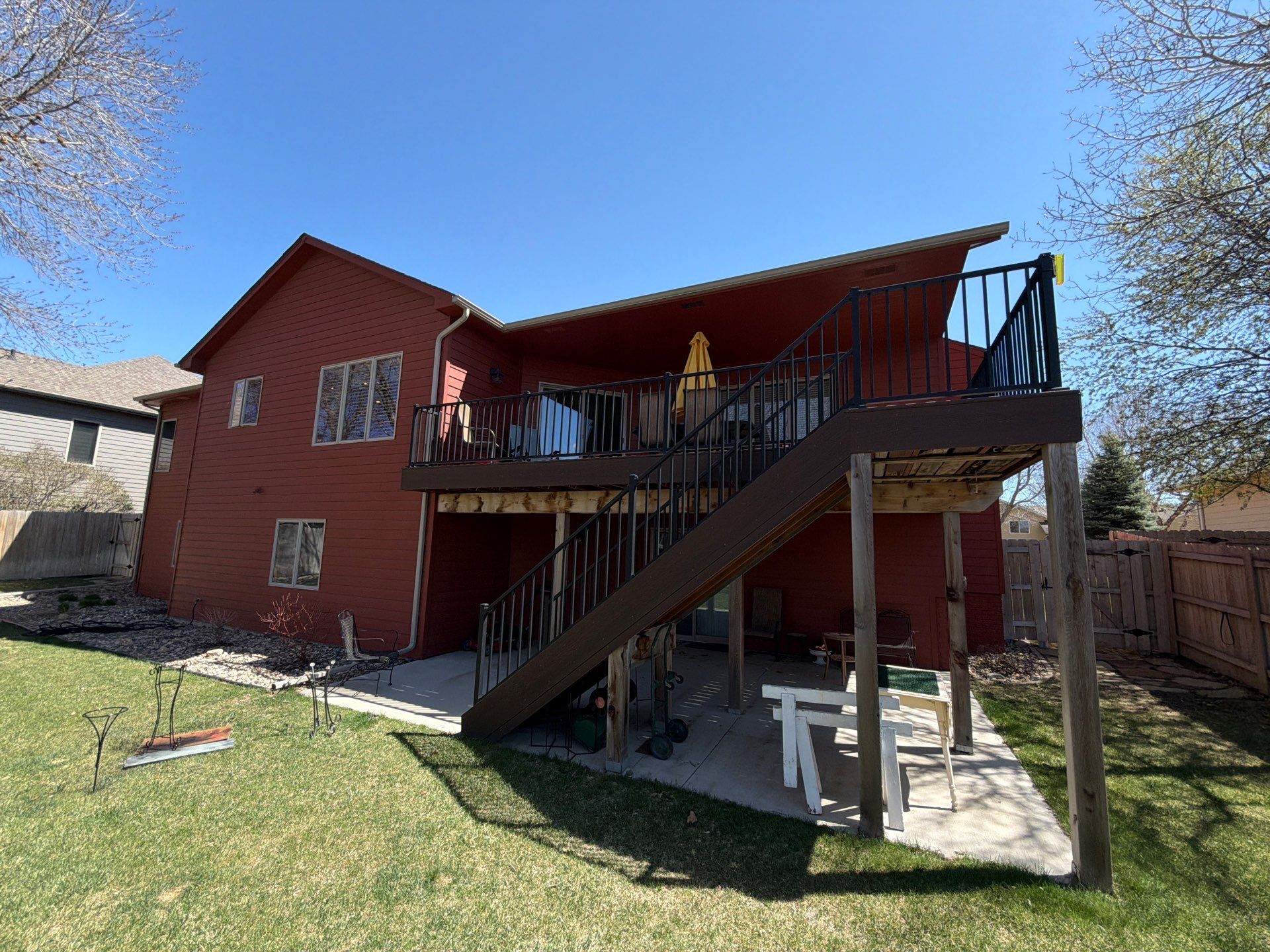 Full Exterior Home Repaint and Siding Refresh in Sioux Falls by Select Painting, Coatings & Garage Cabinets