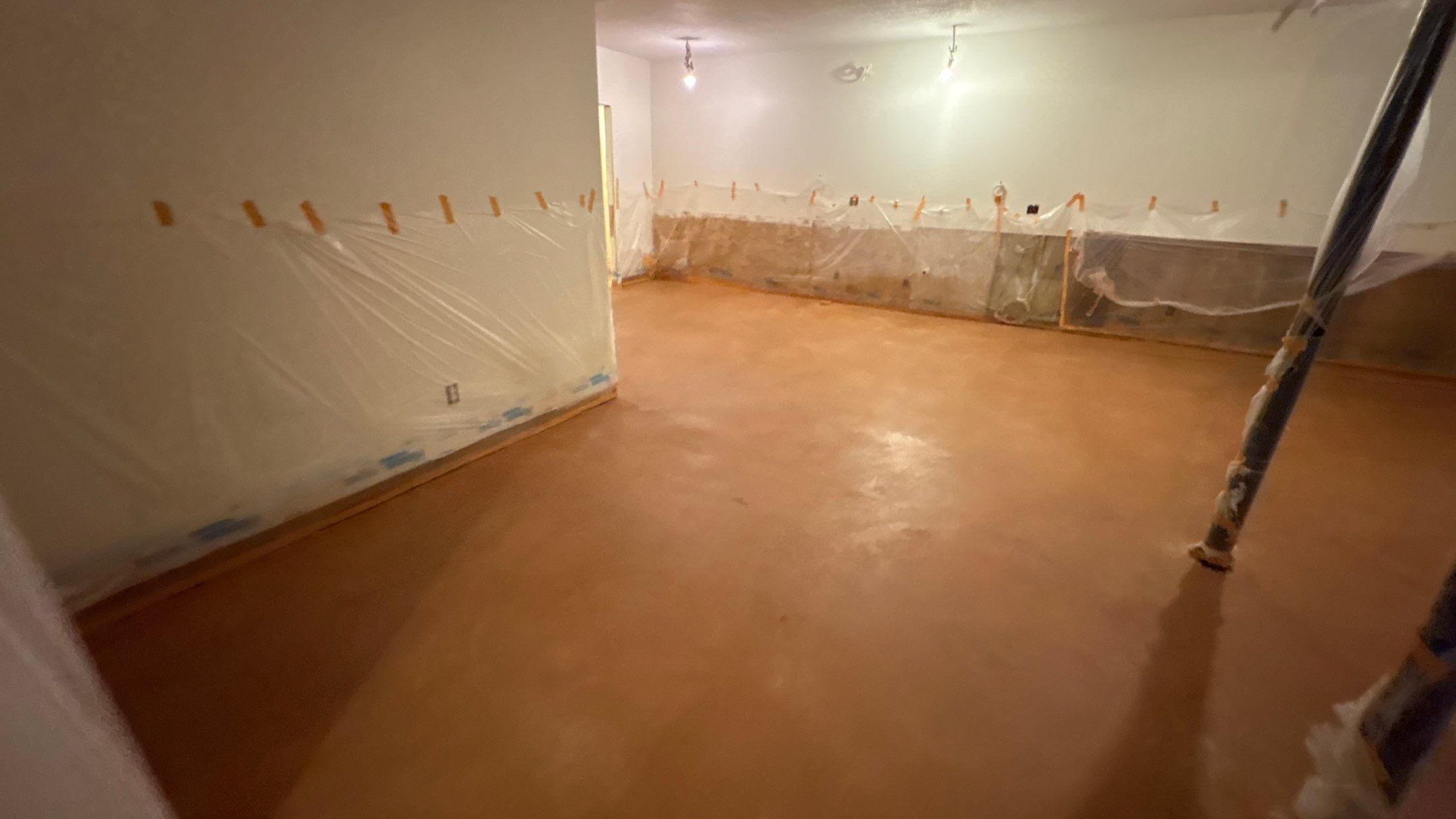 Basement Floor Remodel with Haven Reno KC by Big Red Decorative Concrete, LLC