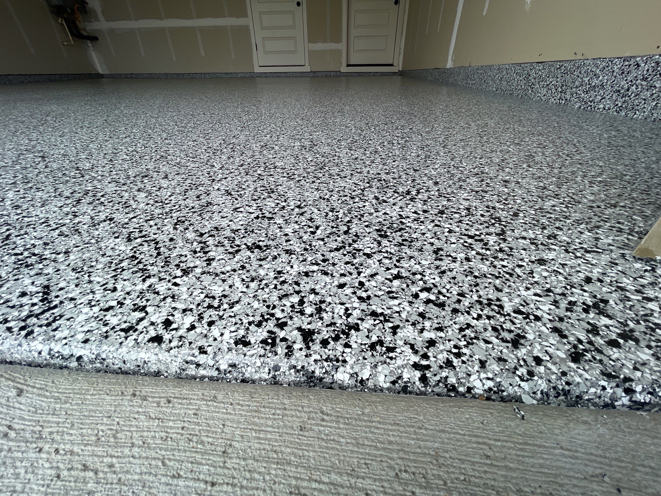 Garage Transformation using Domino by Croc Coatings, LLC