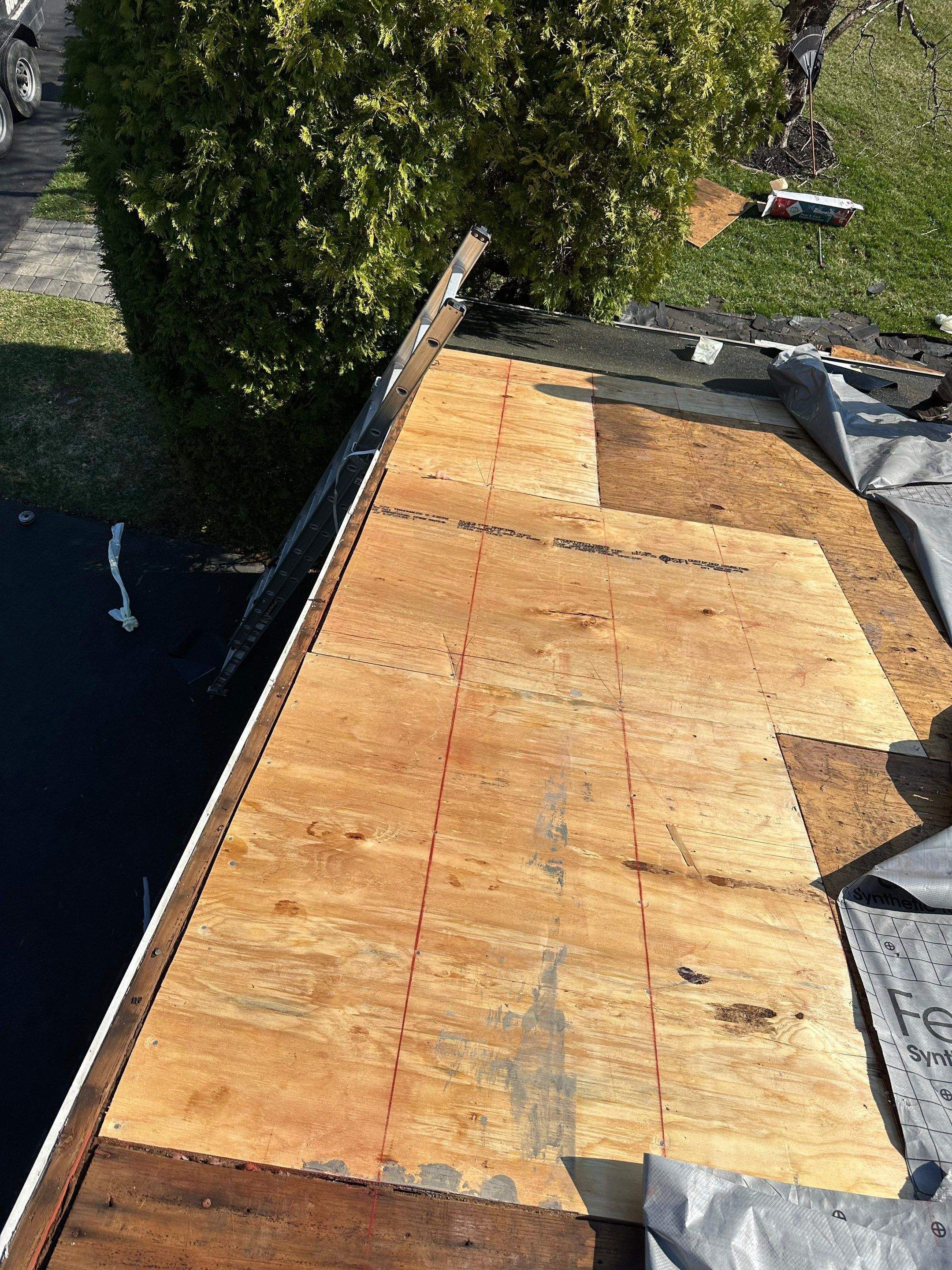 Roofing and Gutters  by Stofan Construction LLC