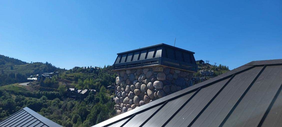 Standing Seam Metal Roof Replacement After Snow Damage by ASAP Roofing & Restoration
