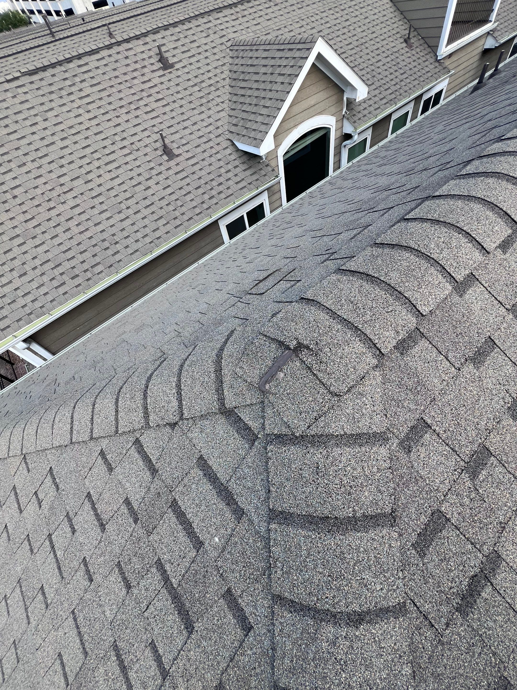 Hail Damage using Owen's Corning Duration (Lifetime) Shingles by Roof Repair Company