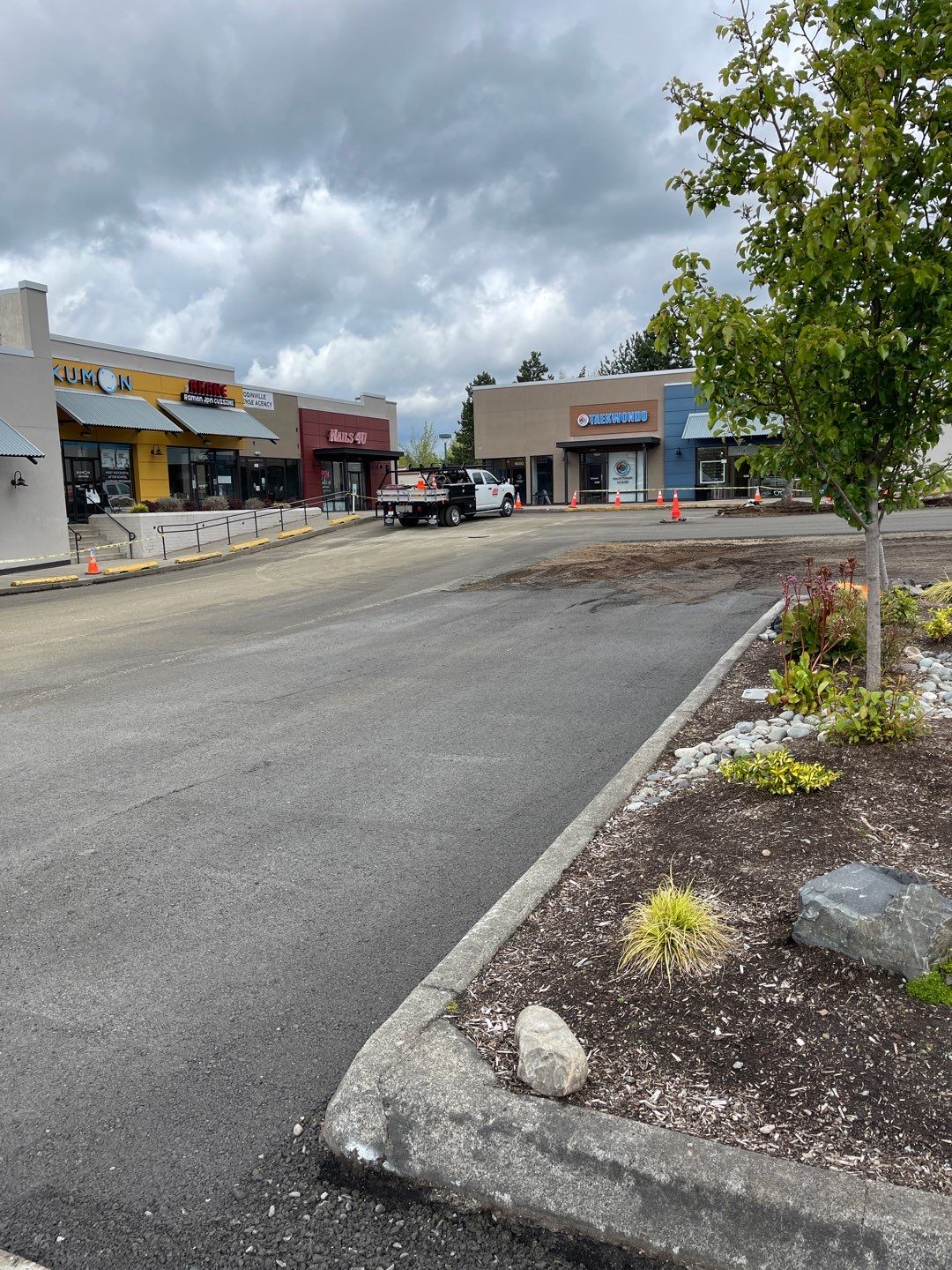 Colliers - Woodinville New Asphalt Parking Lot by Jireh Asphalt & Concrete Inc 