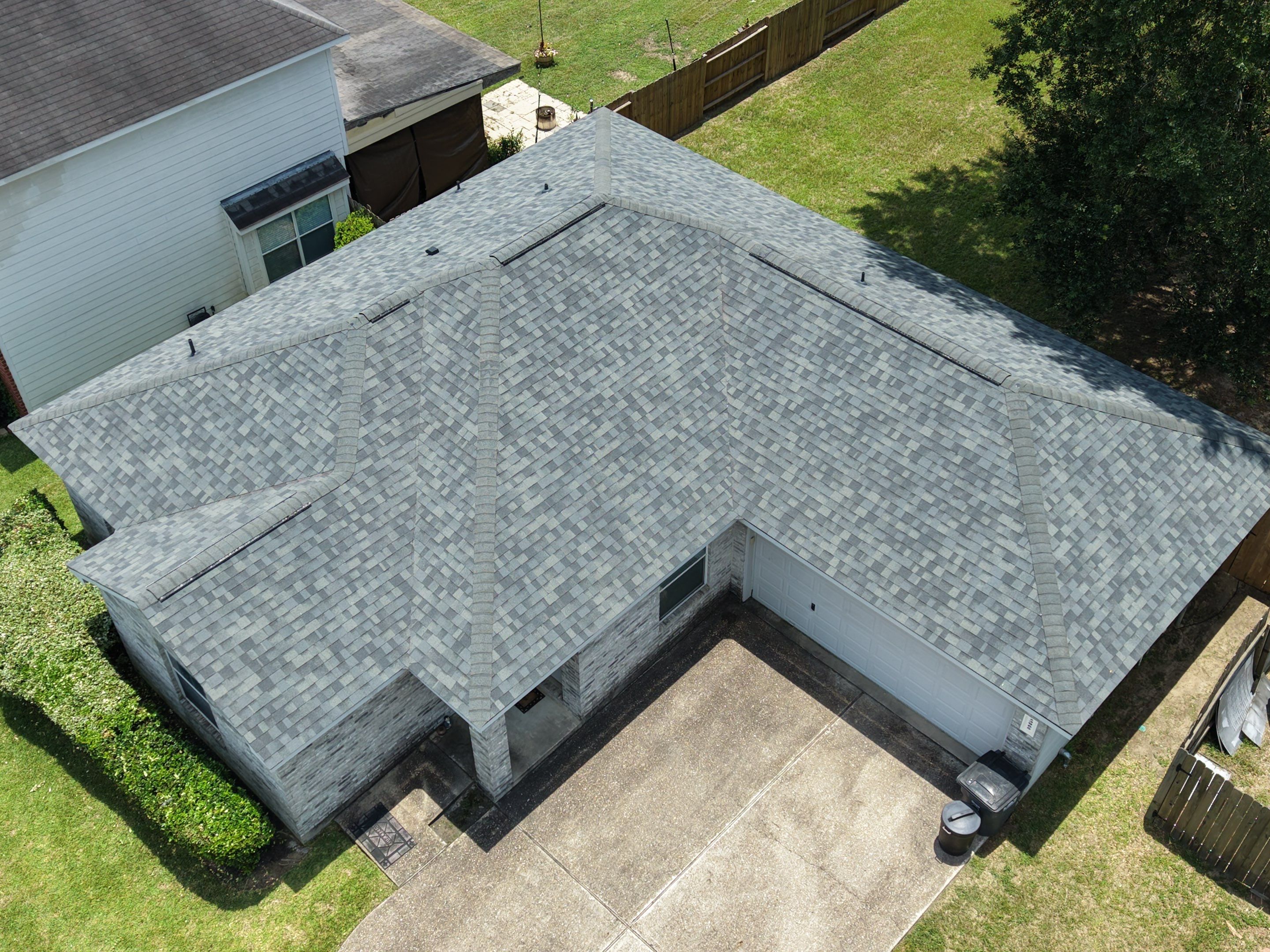Owens Corning Duration Shingle Roof Replacement in Willis, Texas by Abbott Roofing Company