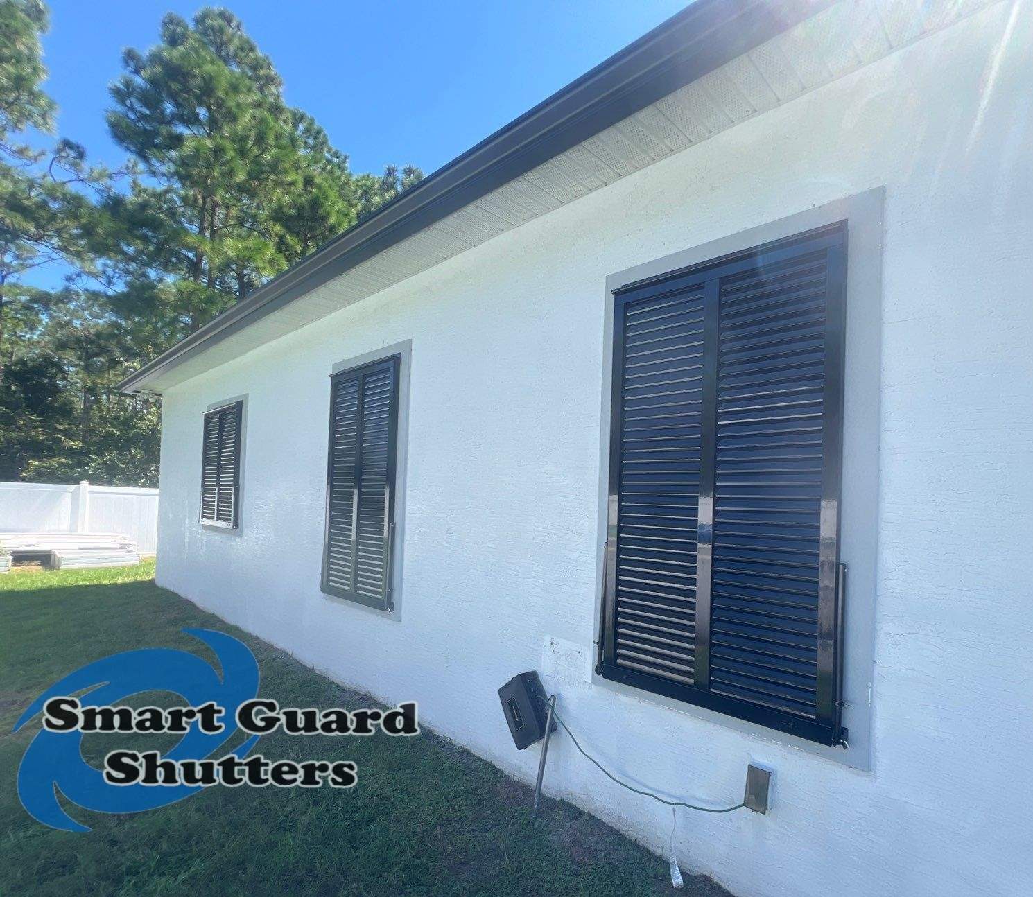 Impact Bahama Shutters in Jet Black by Smart Guard Shutters