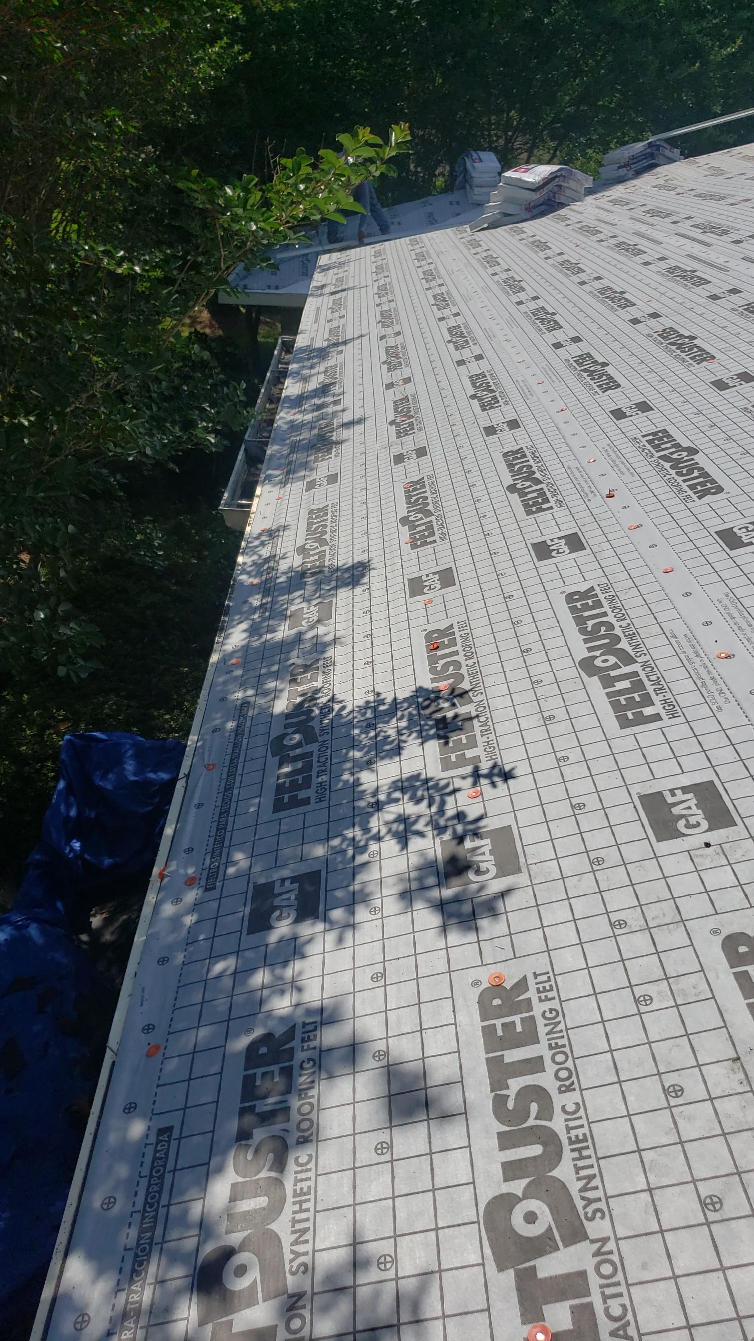 Residential Roofing Installation using Roof Replacement by American Roofing & Construction LLC
