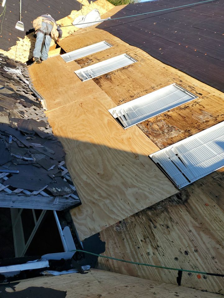 Residential Roofing Installation using Roof Replacement by American Roofing & Construction LLC