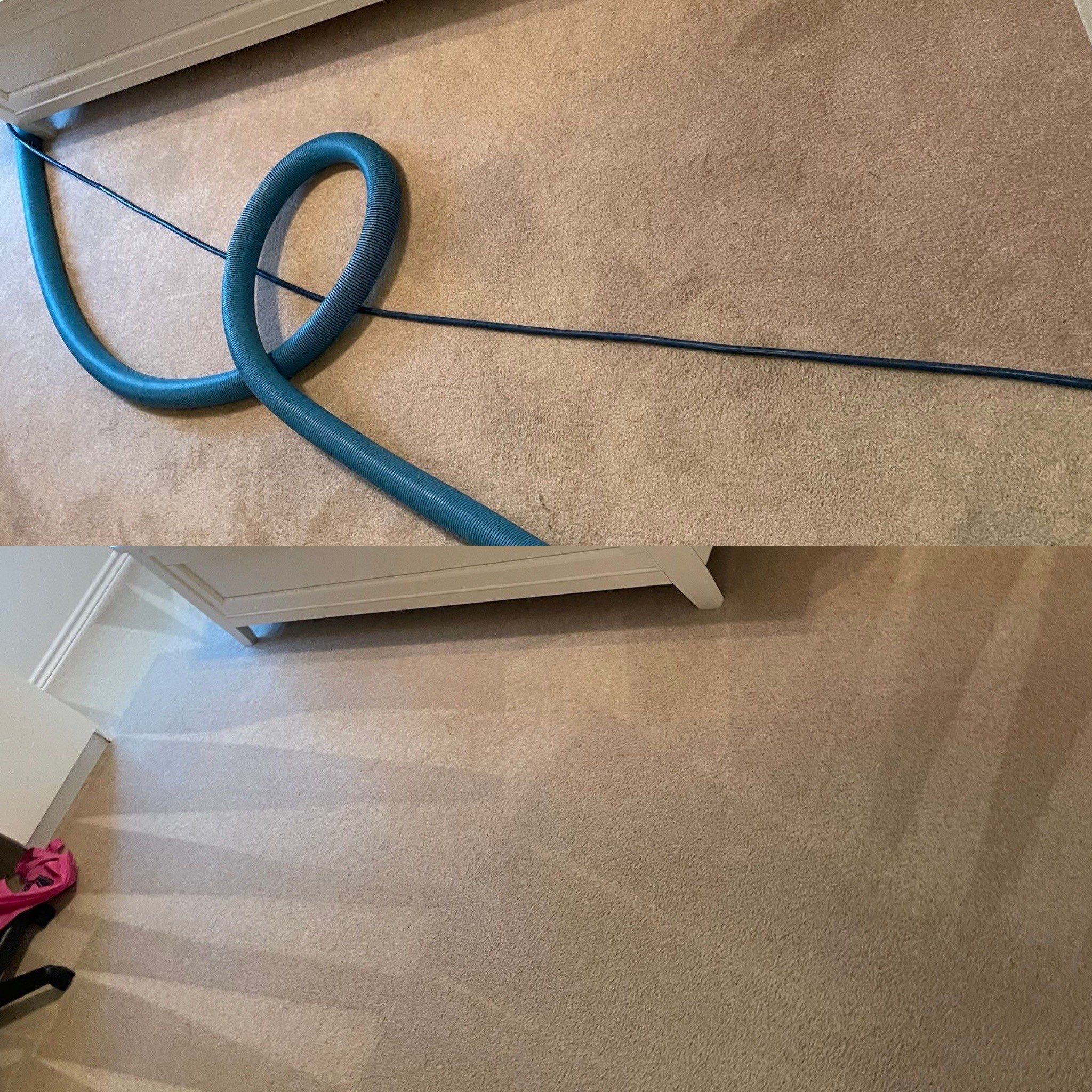 the service being done is deep carpet cleaning using a vacuum hose for extraction and stain removal from the surface