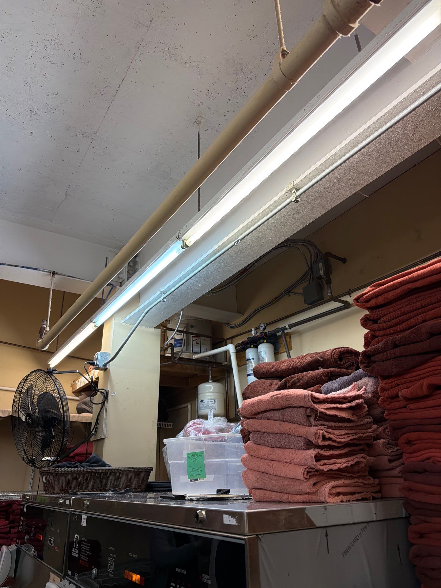 Commercial Laundry Room Outlet & Fluorescent Light Wiring by Spartan Home Pros