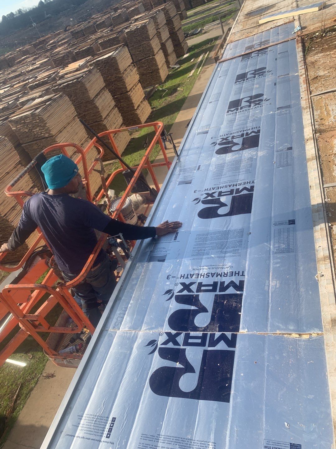 Commercial Roofing Installation using Aluminum Roofing panels by Hostetler Roofing
