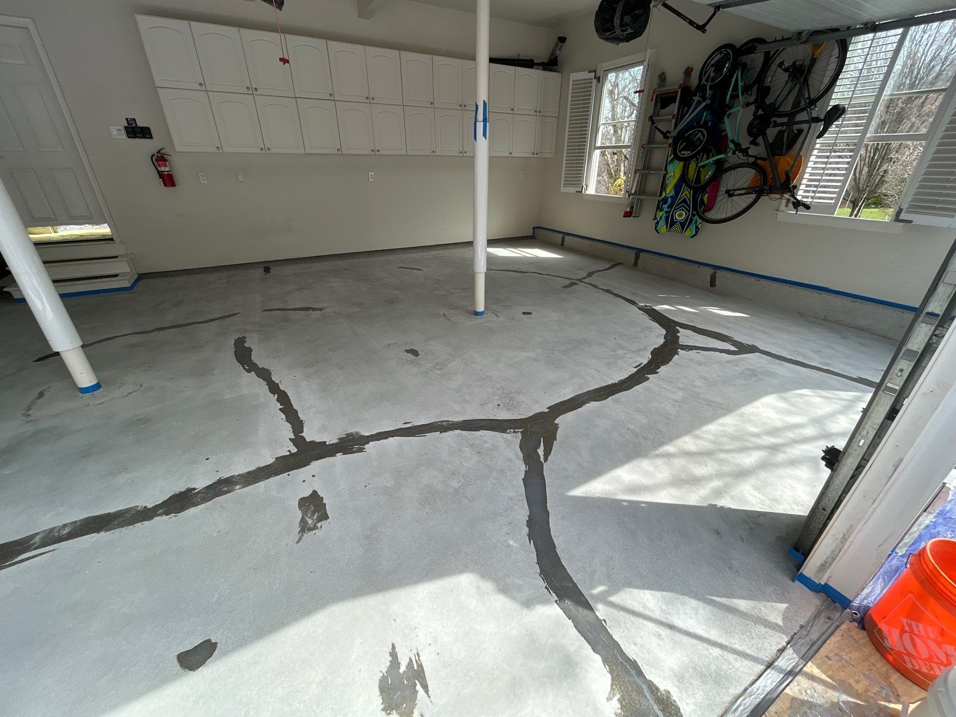 Concrete Floor Coating Transformation by DiGiorgi Roofing and Siding Inc