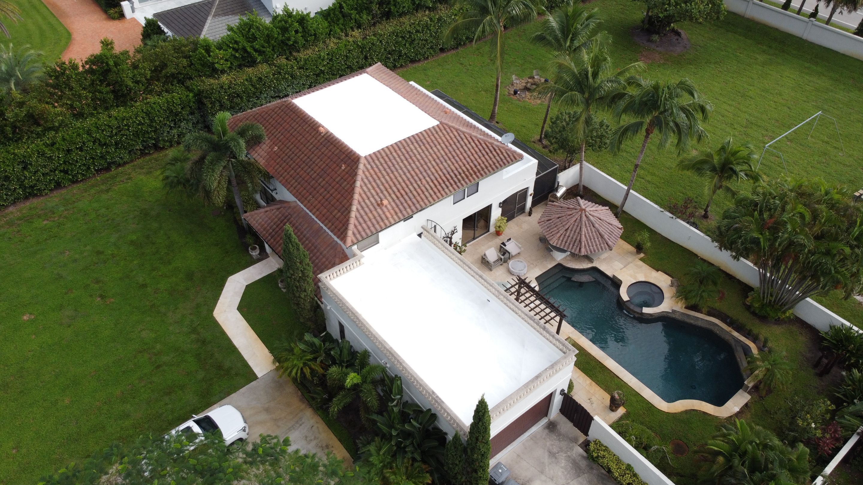 Residential Roofing Installation using Polybrite 90.1 silicone coating by BLUES BROTHERS CONSTRUCTION CORP