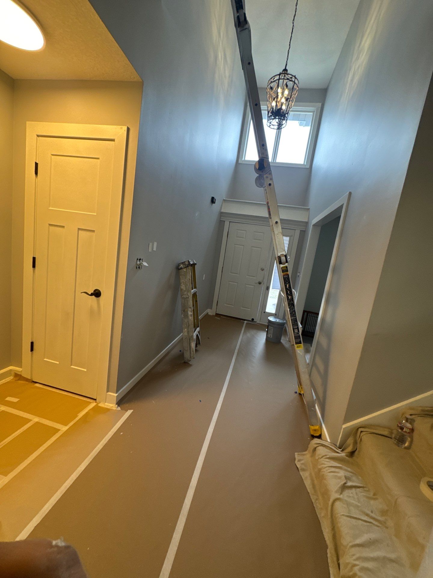 Residential Interior Wall Repaint | Foyer, Stairwell, Hallway & Living Room by Midwest Paint LLC