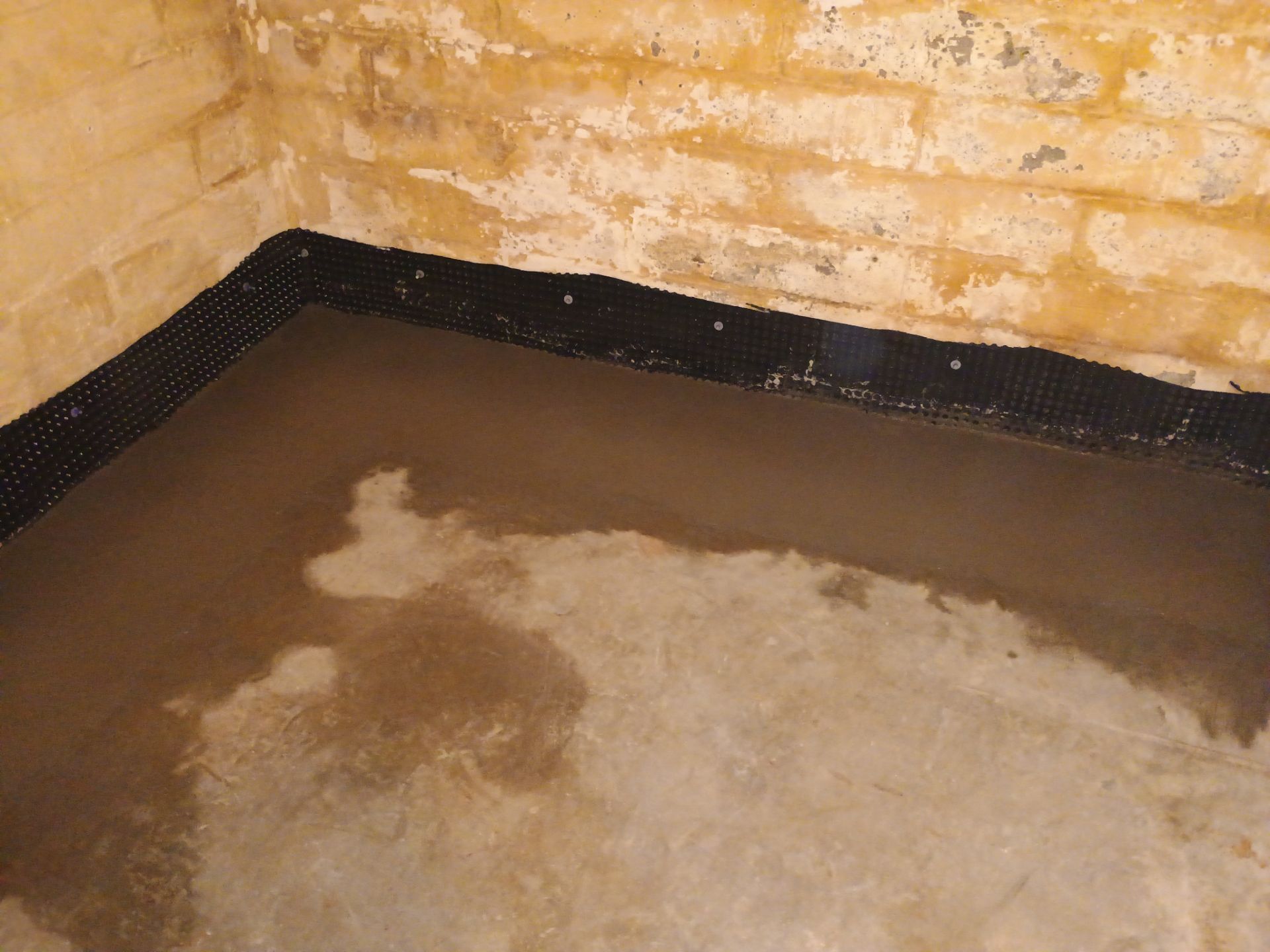 Interior Drain Tile for a South Minneapolis Basement by Waterproofing Northeast