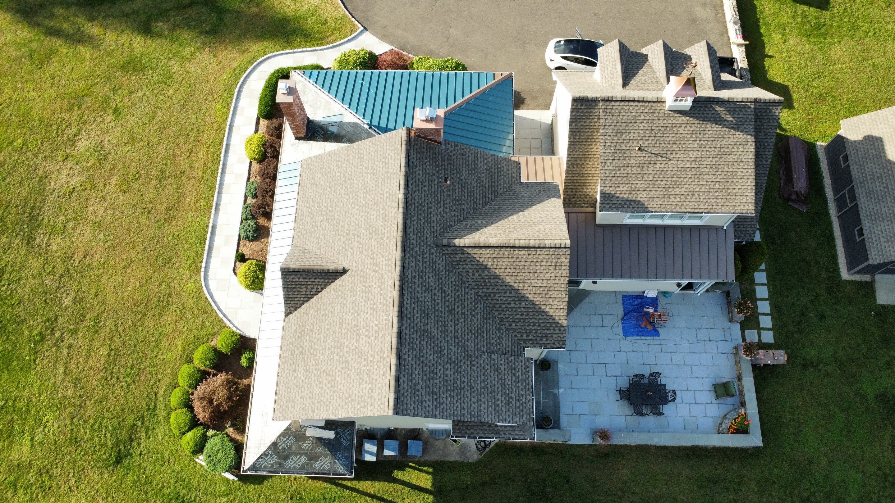 Asphalt & Standing Seam Metal Roof Replacement  by Lecla Home Improvements and Roofing INC
