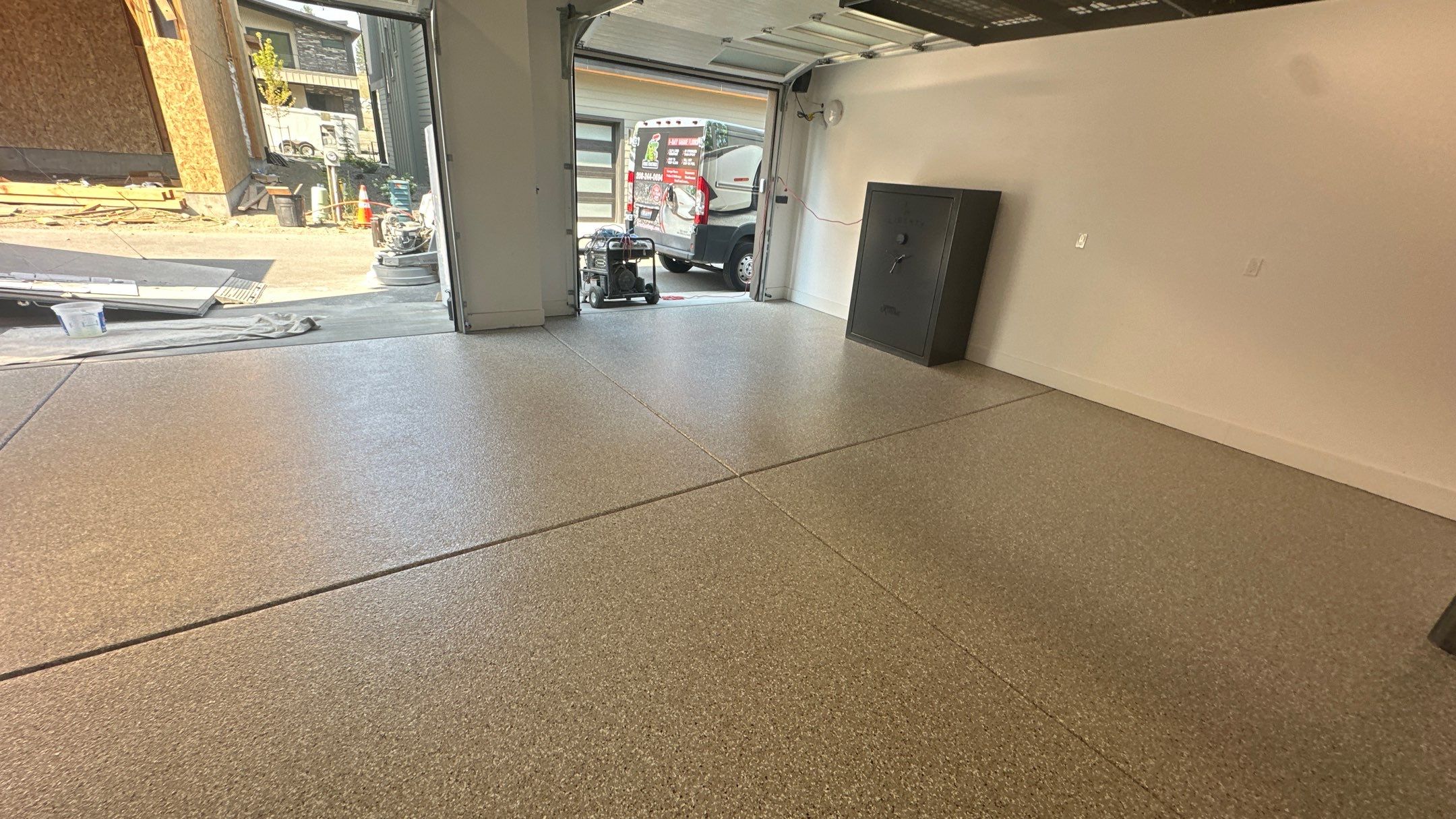 Garage Transformation using Pebble Beach by Croc Coatings, LLC
