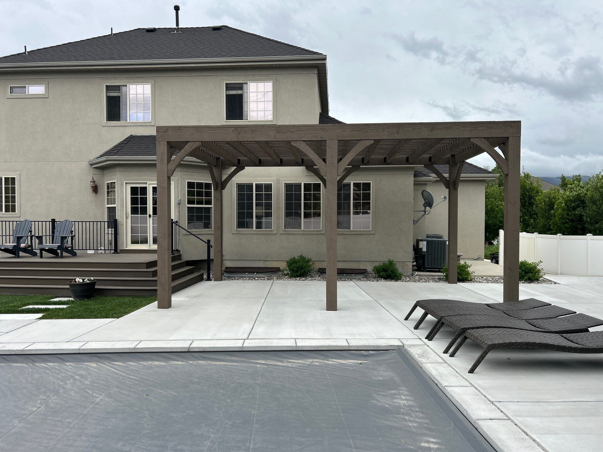 Poolside Concrete Patio Pergola by SAGE Decks