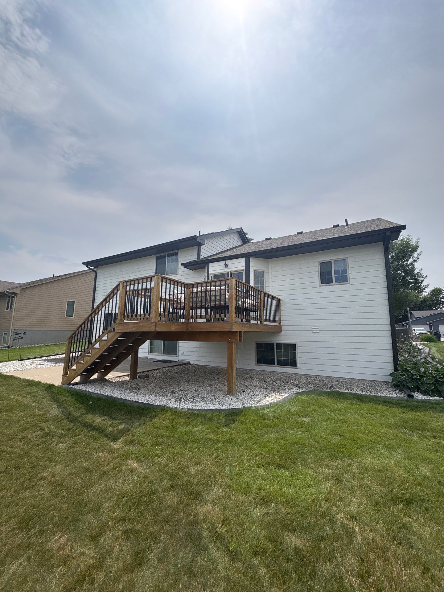 Residential Exterior Painting and Siding Refresh in Sioux Falls by Select Painting, Coatings & Garage Cabinets