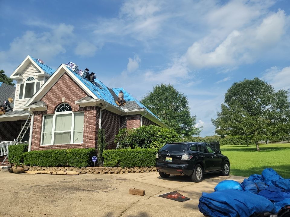 Residential Roofing Installation using Roof Replacement by American Roofing & Construction LLC