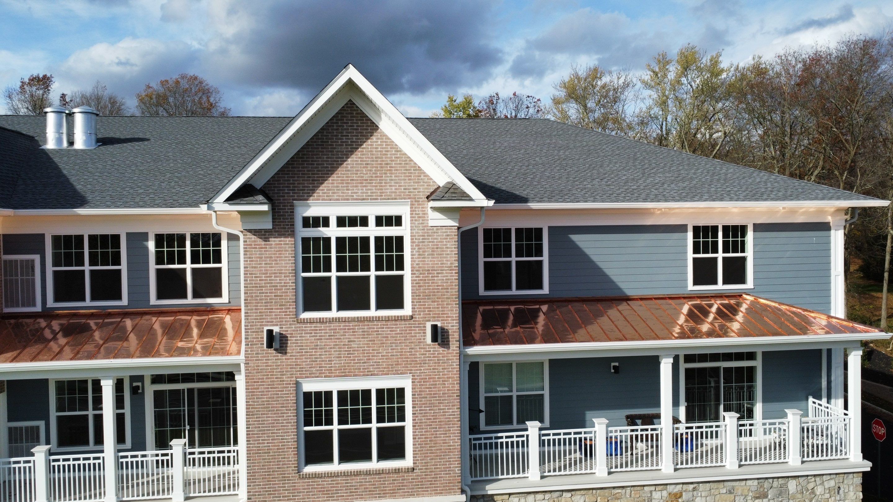 Standing Seam Metal Roof using Copper by CMNG LLC