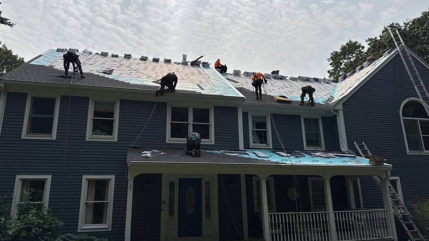 Solar-Ready Roof Replacement with GAF Pewter Gray Shingles & VELUX Skylights by Sensible Home Solutions