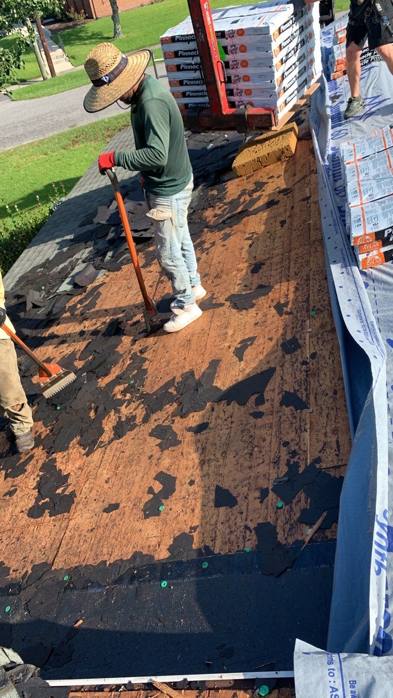 Hail Damage using Atlas Pristine Pinnacle Shingles by Artigues Roofing & Restoration Services