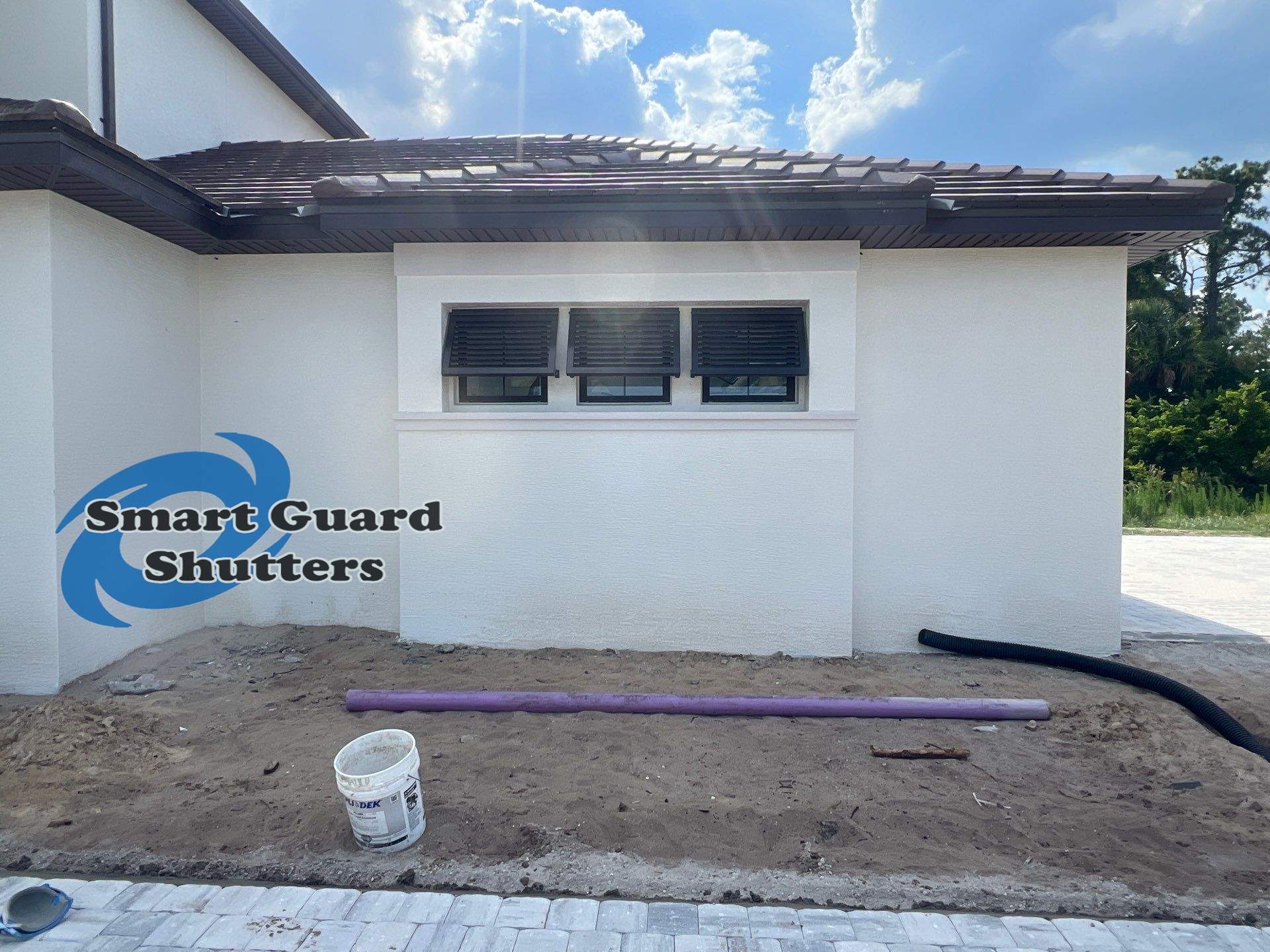 Decorative Bahamas in Umbra Grey by Smart Guard Shutters