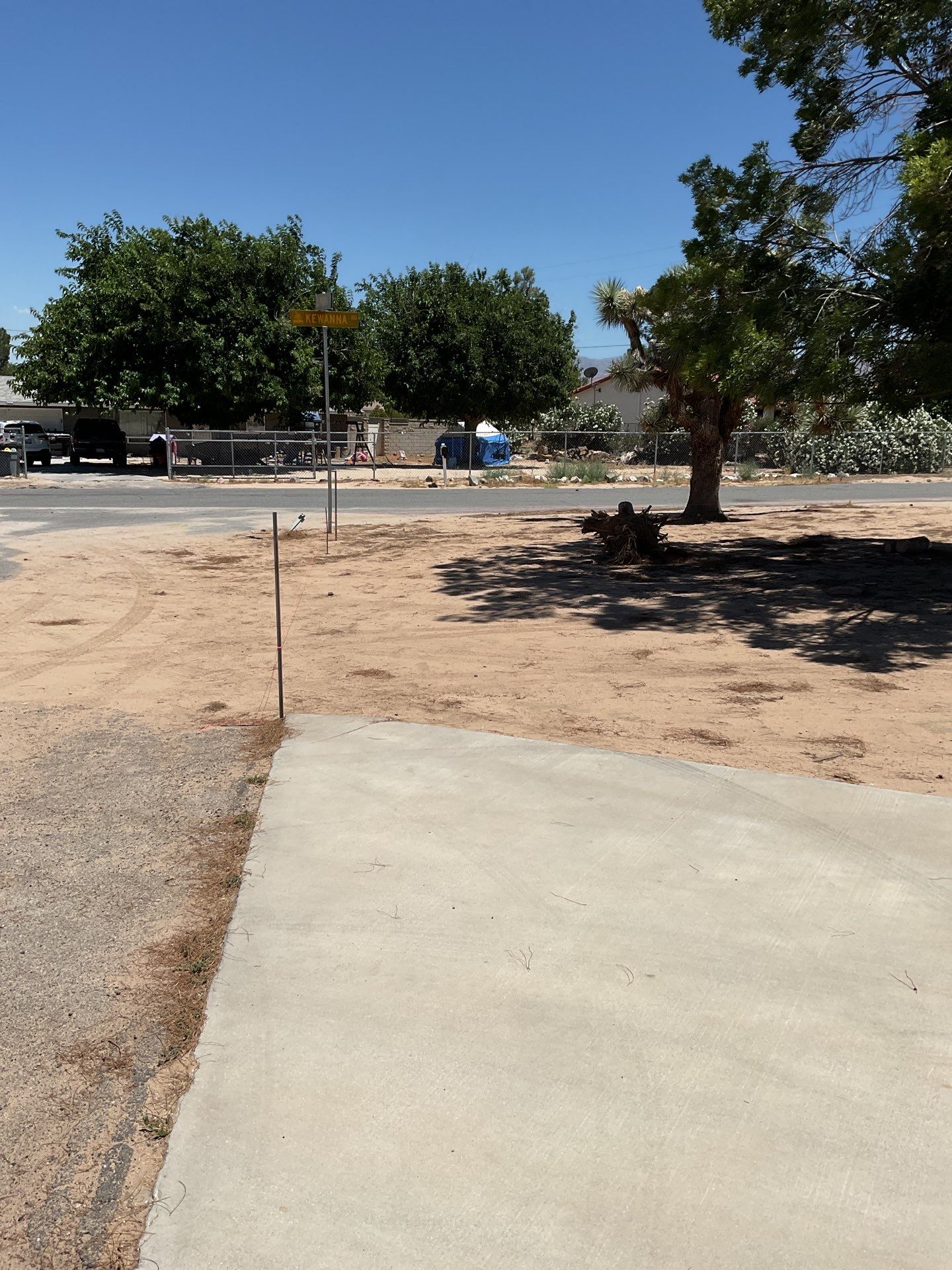 4ft White Vinyl Fence with Solar Power Motorized Gate by Fence Guys Inc.