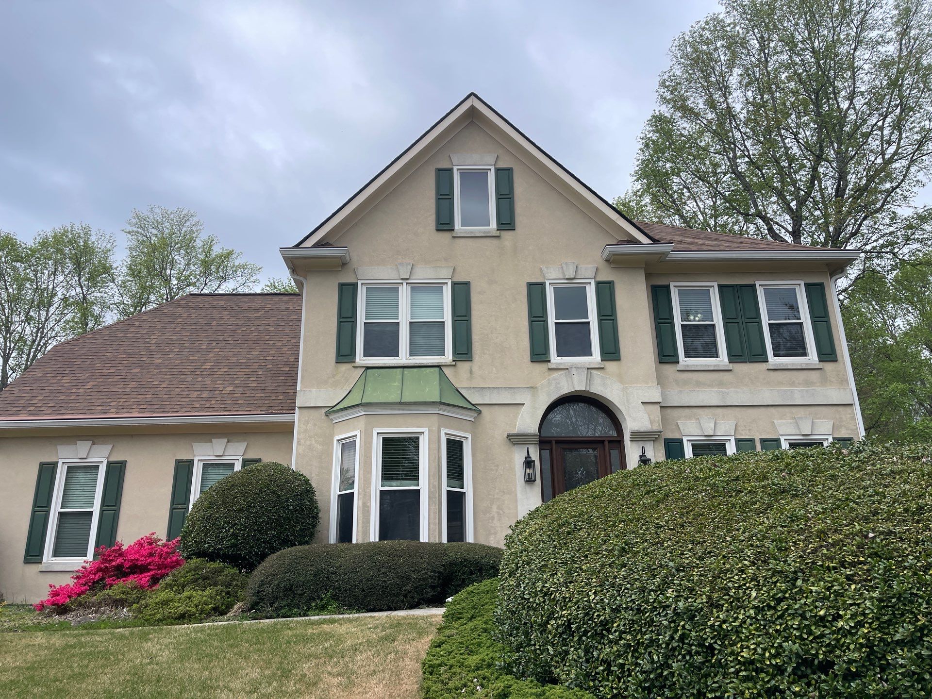 Exterior Painting using Sherwin-Williams and Rotted Wood Replacement by Nelson Exteriors 
