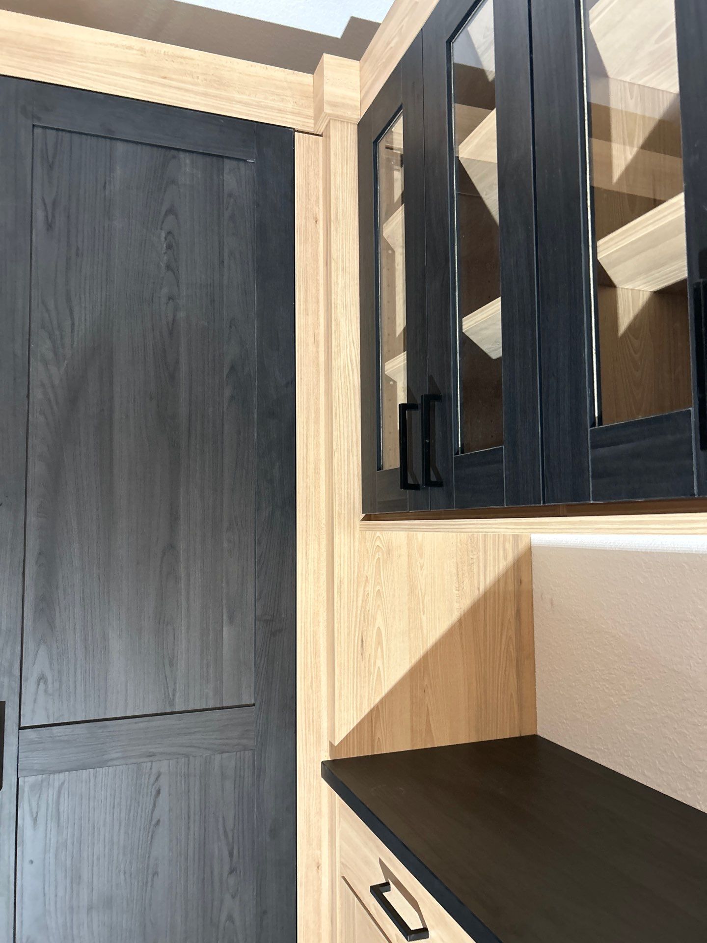 Two-Tone Closet with matching Mudroom + Laundry Room by Concept 32, Inc.