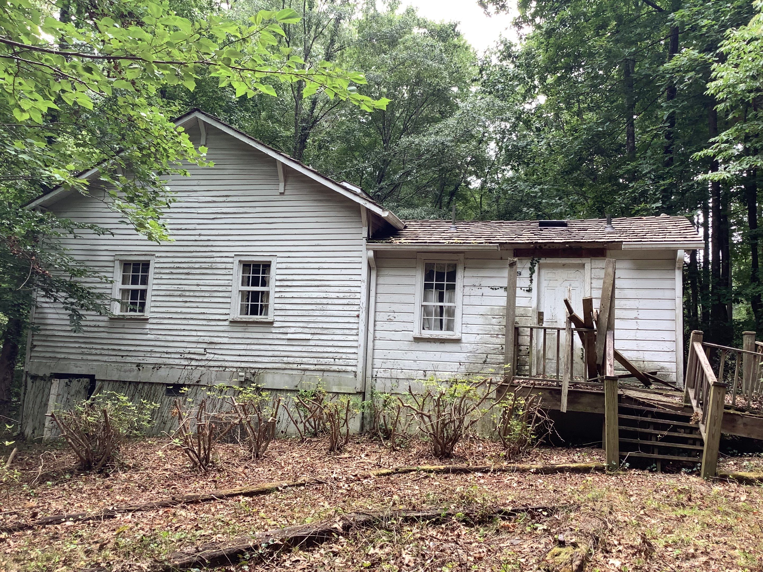 Exterior Painting and Siding Refresh for Kennesaw Historic Structure by Swift Home Renovations