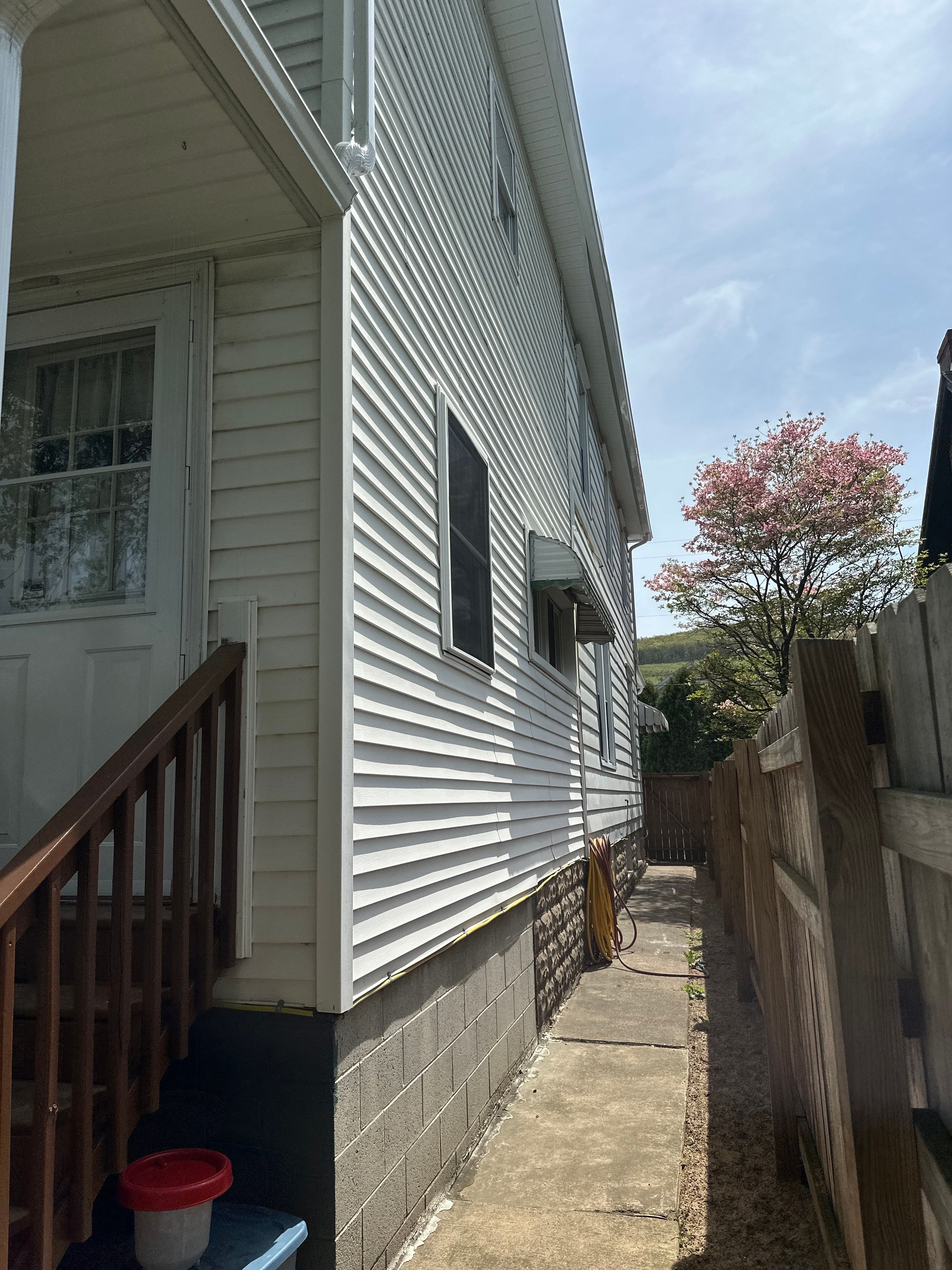 Charcoal Metal Roof & Blue Siding — A Refreshing New Look by Esh Builders