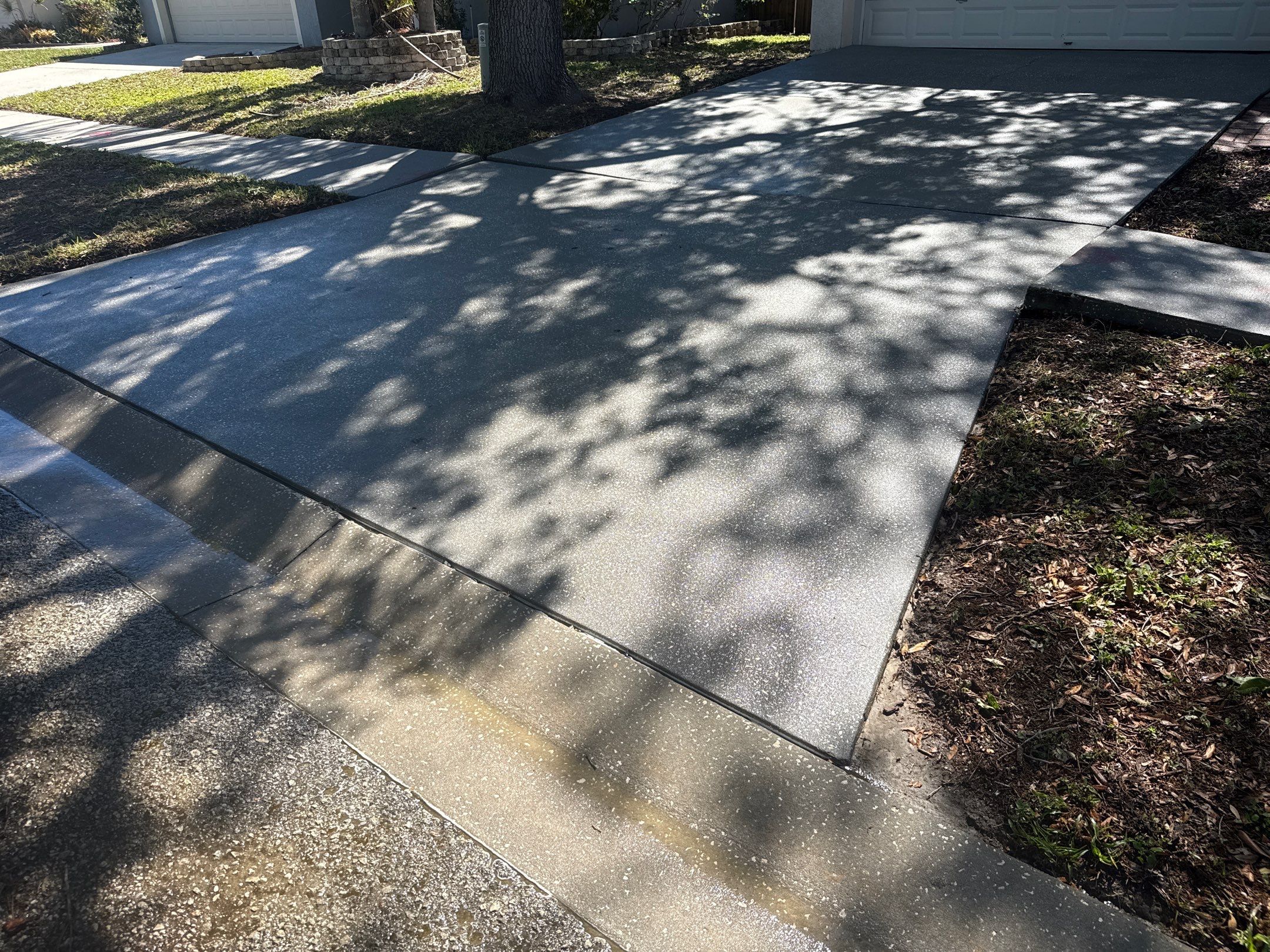 Concrete Driveway & Sidewalk Cleaning ā Peppermill IV at Providence Lakes, Brandon, FL by Sunshine AquaWash