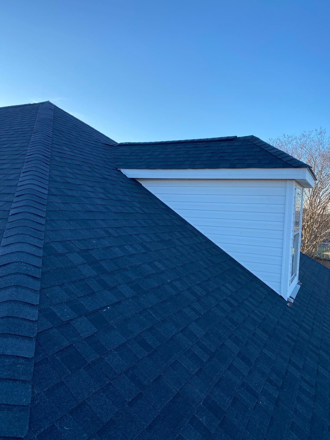 Residential Roofing Installation using Roof Replacement by American Roofing & Construction LLC