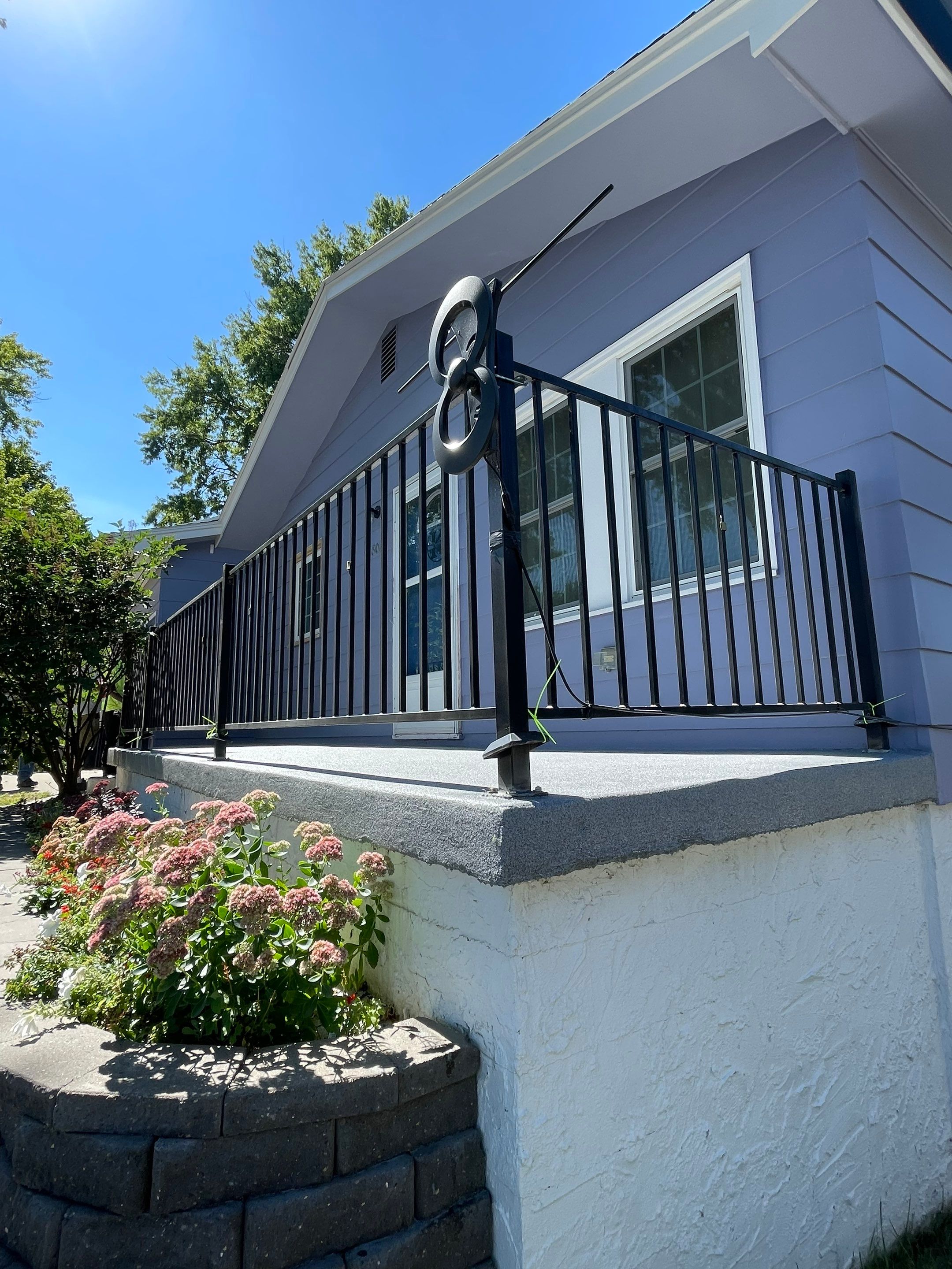 Sioux Falls Concrete Porch Coating with Starry Evening Finish by Select Painting, Coatings & Garage Cabinets