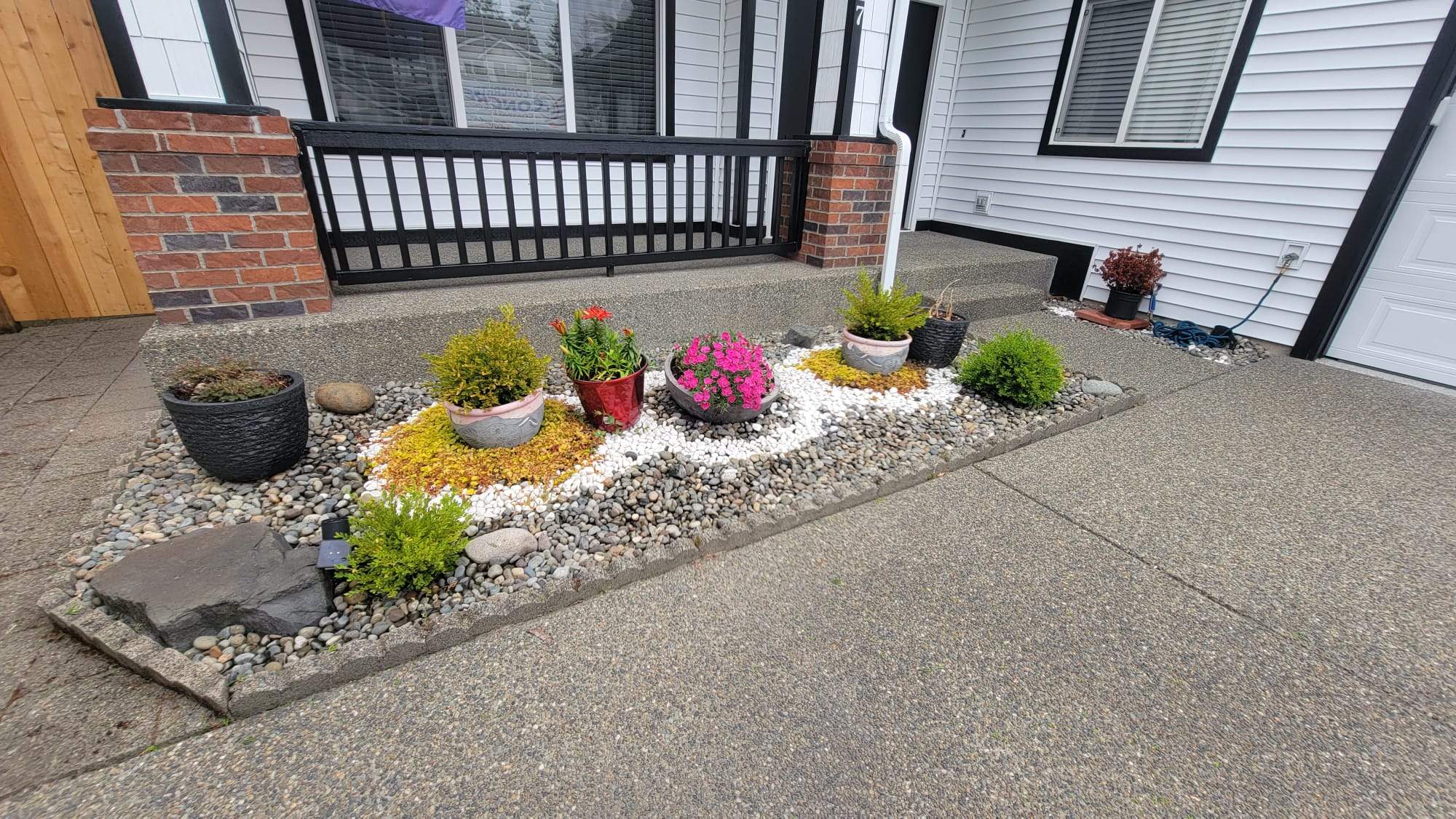 Poseidon Patio and Driveway by Concrete Coating Experts Inc.