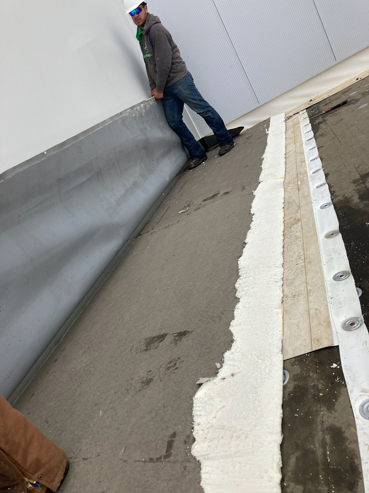 Drain Installation at CJ BIO by Grell Roofing, LLC
