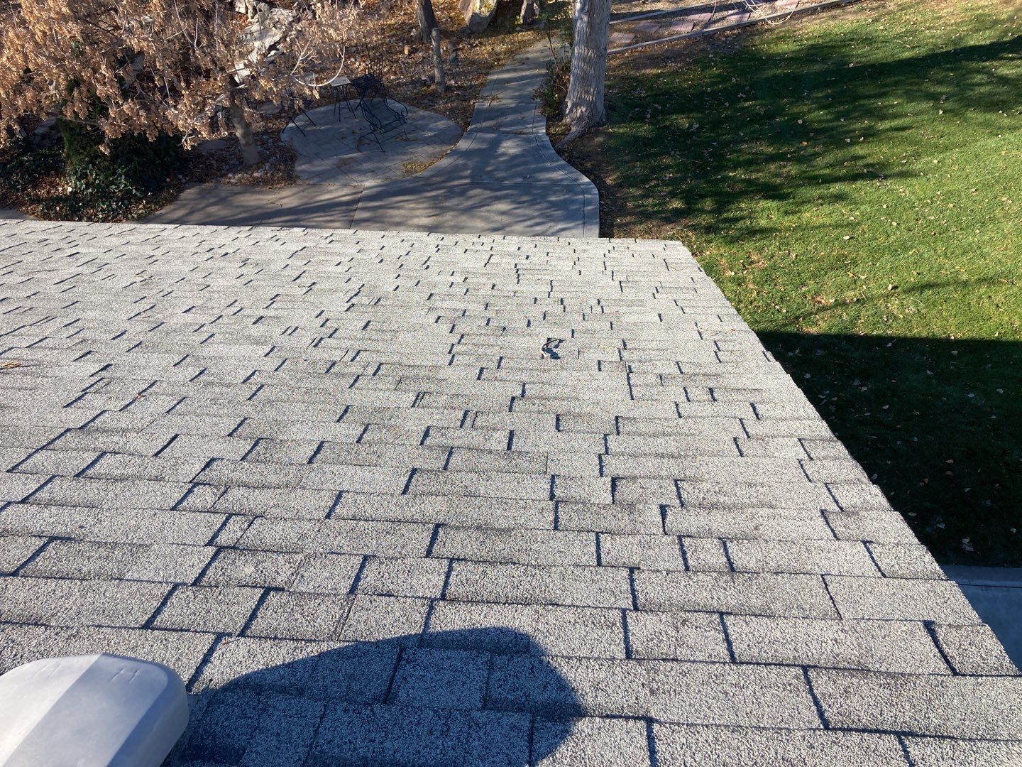 Two story farmhouse style roofing installation using Owens Corning Duration in the color Teak by ID Roofing LLC