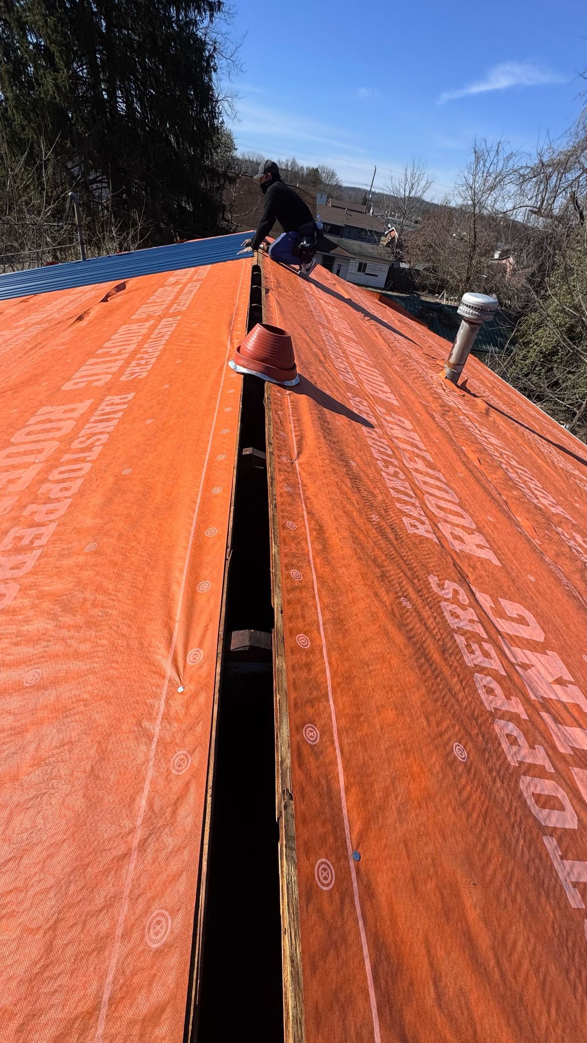 Residential Roofing Installation using Metal by Rainstoppers Roofing