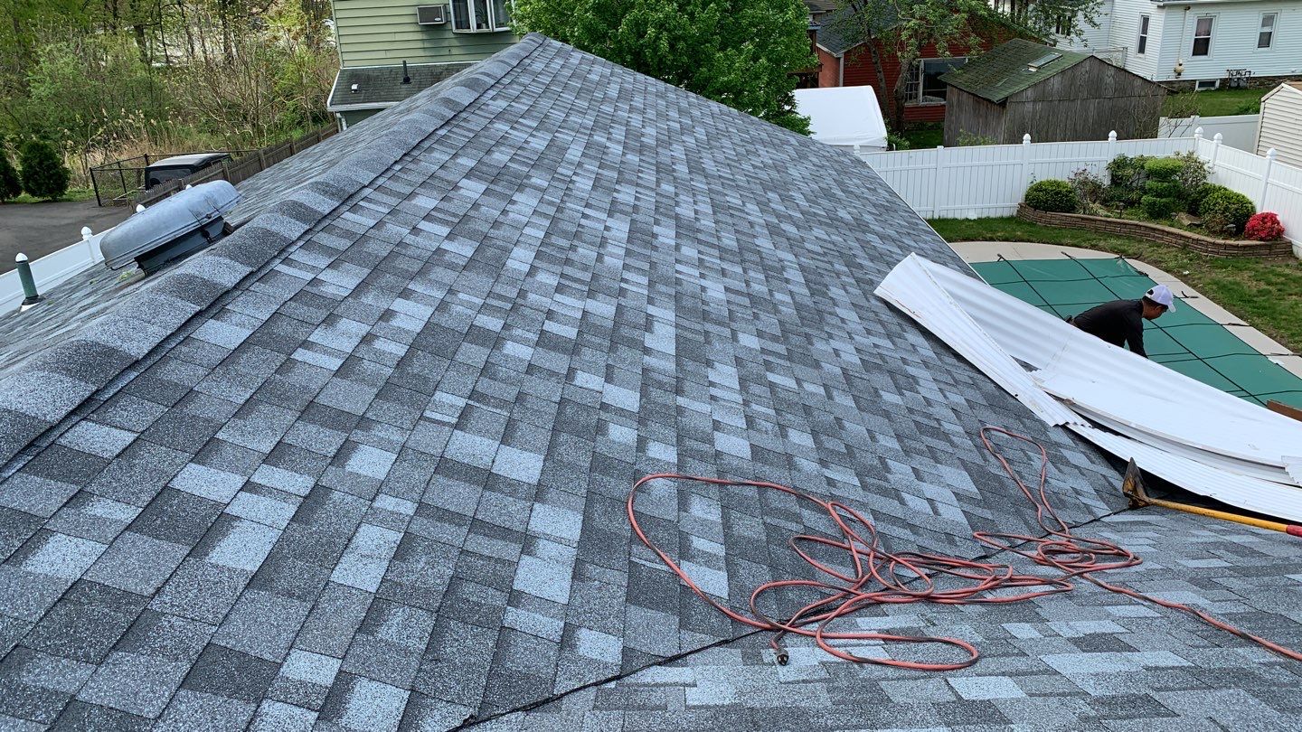 Residential Roofing Installation using Owens Corning Duration Slatestone Gray by A Plus Exterior