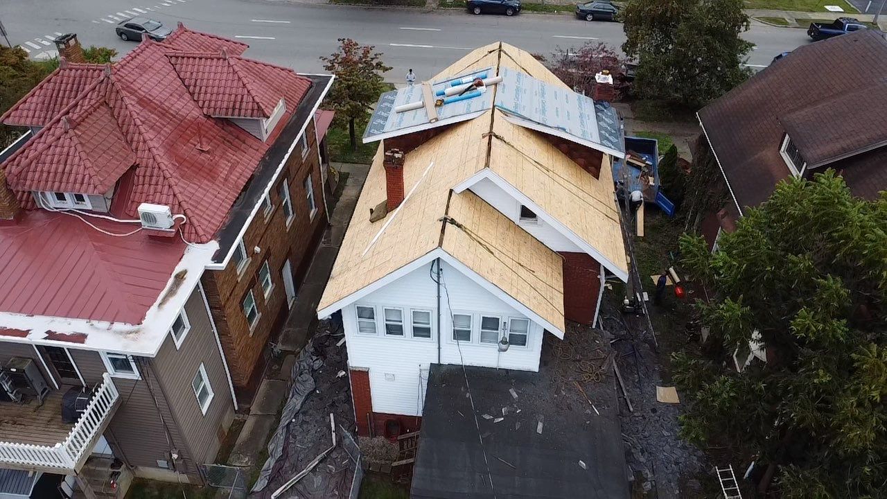 Adkins Project  by Fahey Roofing + Contracting